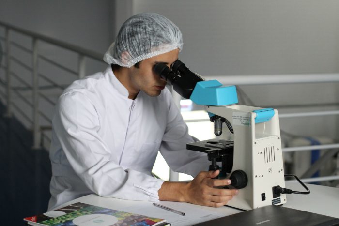 Scientist Inspecting a Specimen