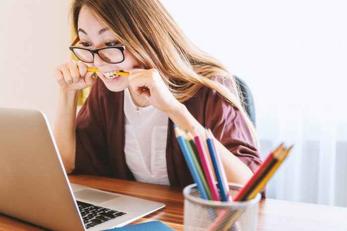 A Student Working on Her Laptop